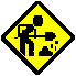 black and yellow sign of worker digging